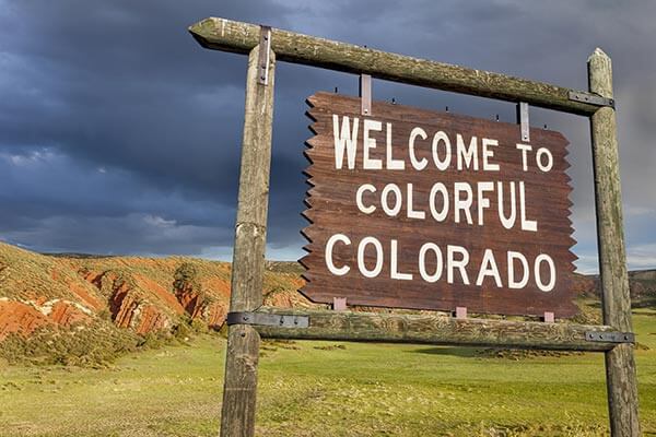 A "Welcome to Colorful Colorado" sign